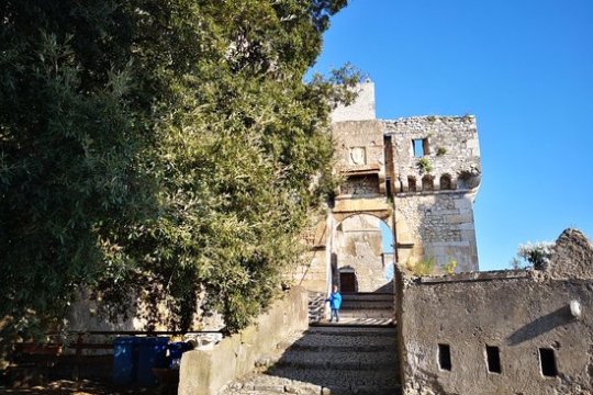 a castle on top of a stone building