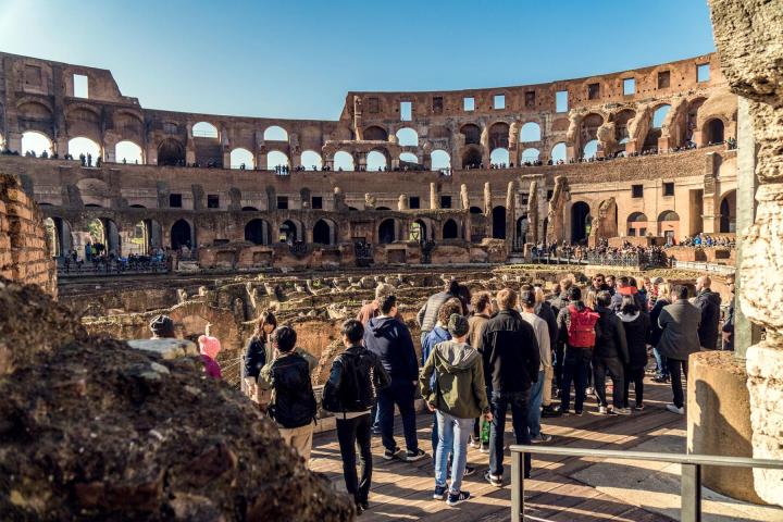 a group of people standing in front of a building