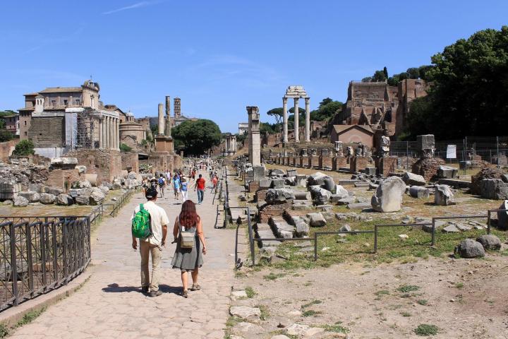 a group of people standing outside of a building