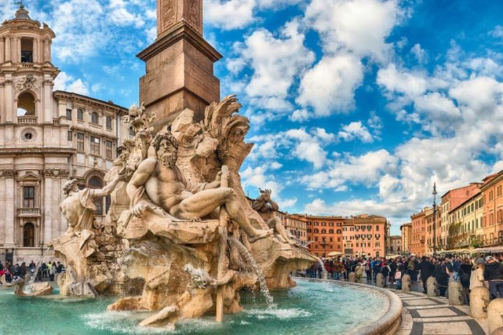 a group of people standing in front of a building