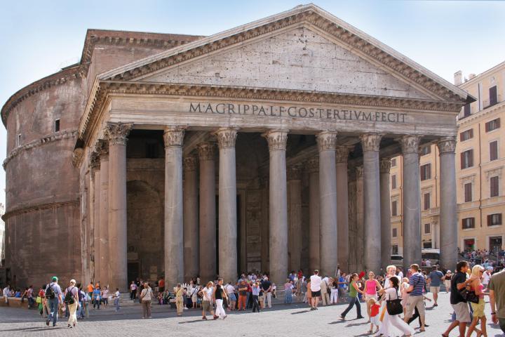 a group of people standing in front of Pantheon, Rome
